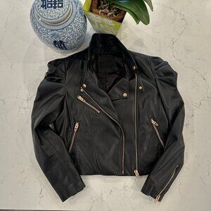 BLANK NYC Black faux leather moto jacket with puff sleeve type detail